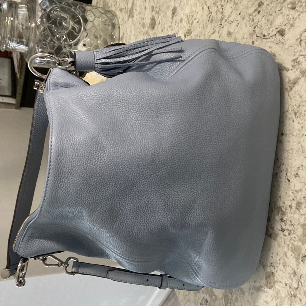 Very lovely light blue Michael Kors bag used once!!